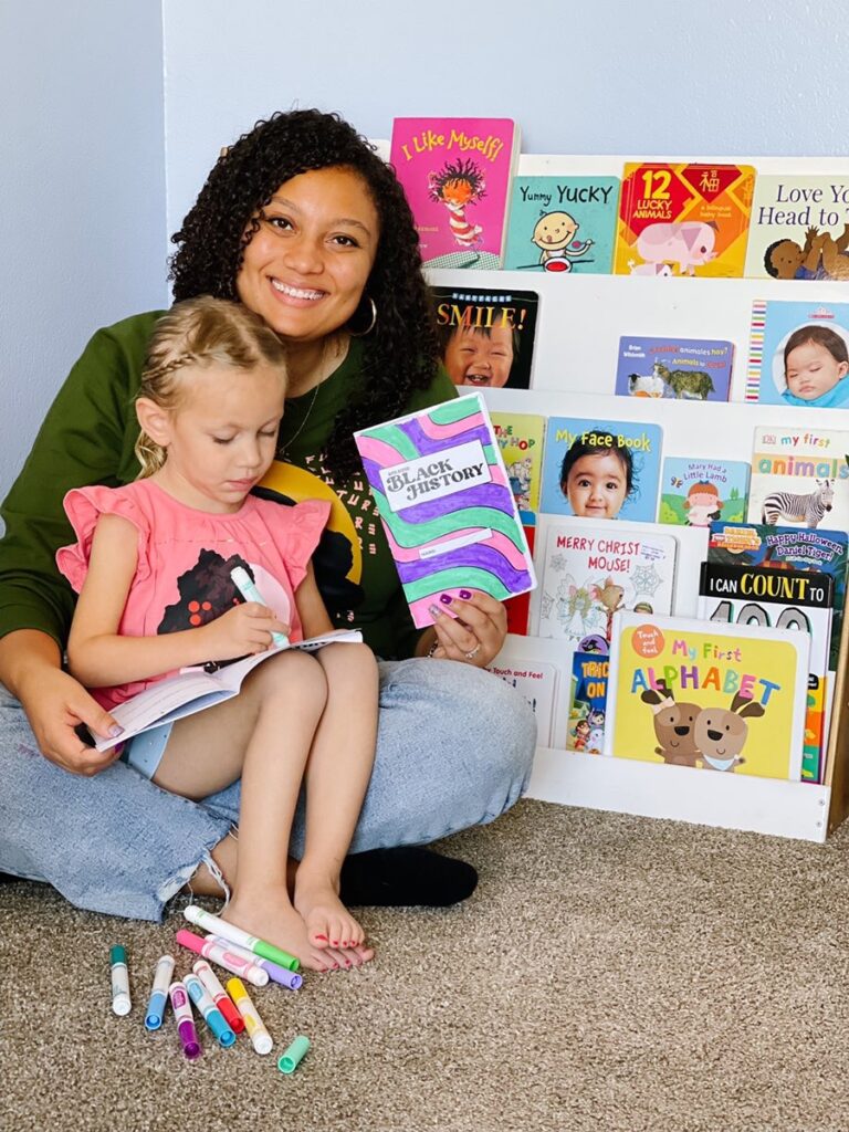 Mom with daughter working together on Bite-Sized Black History booklet